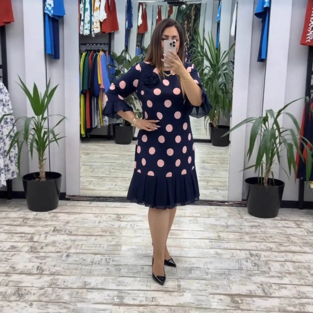 Jocelyn - Retro-inspired dress with pleated skirt and flared sleeve cuffs
