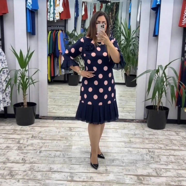 Jocelyn - Retro-inspired dress with pleated skirt and flared sleeve cuffs