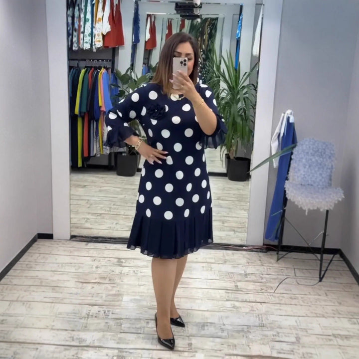 Jocelyn - Retro-inspired dress with pleated skirt and flared sleeve cuffs