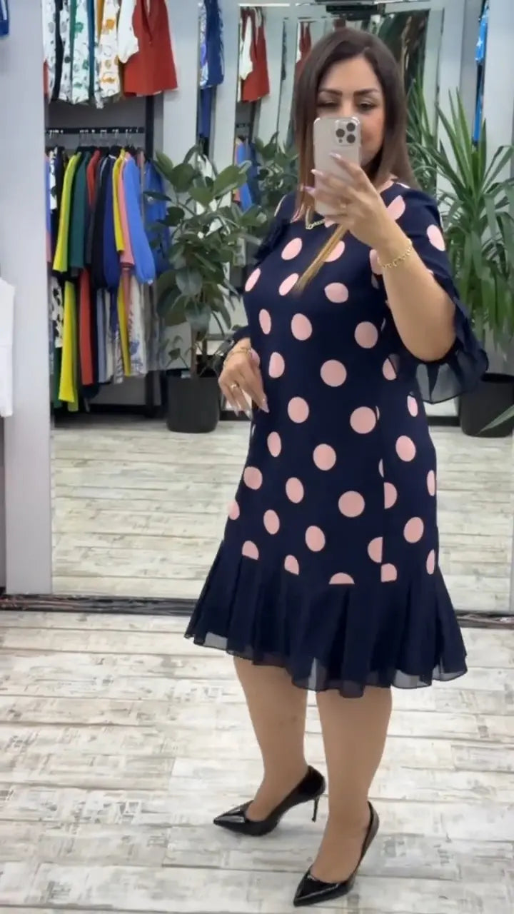 Jocelyn - Retro-inspired dress with pleated skirt and flared sleeve cuffs